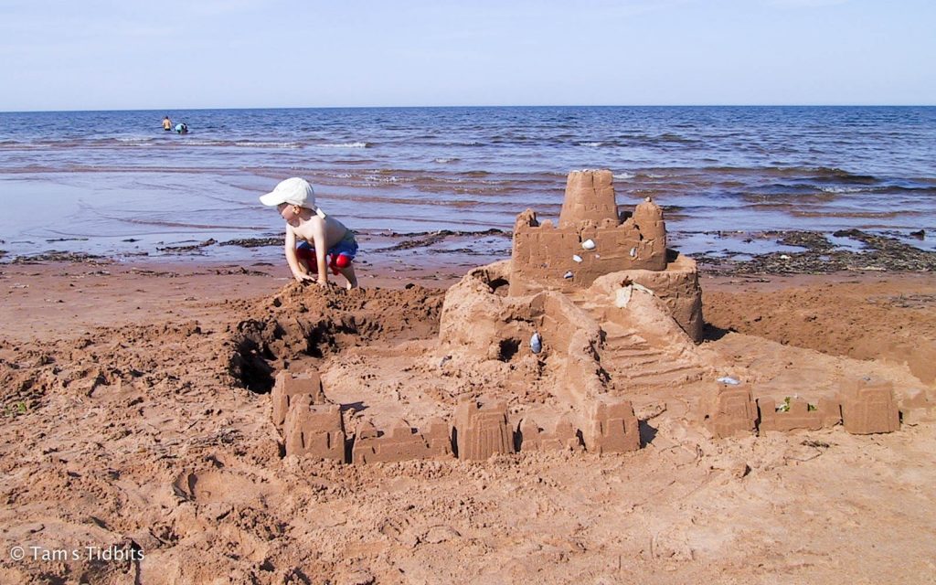 Sandcastle building at Cavendish Beach